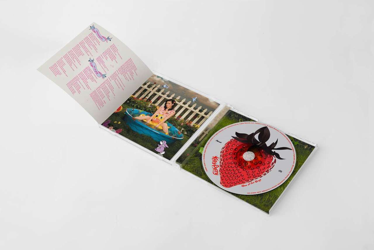 Interior booklet spread with lyrics page and photography